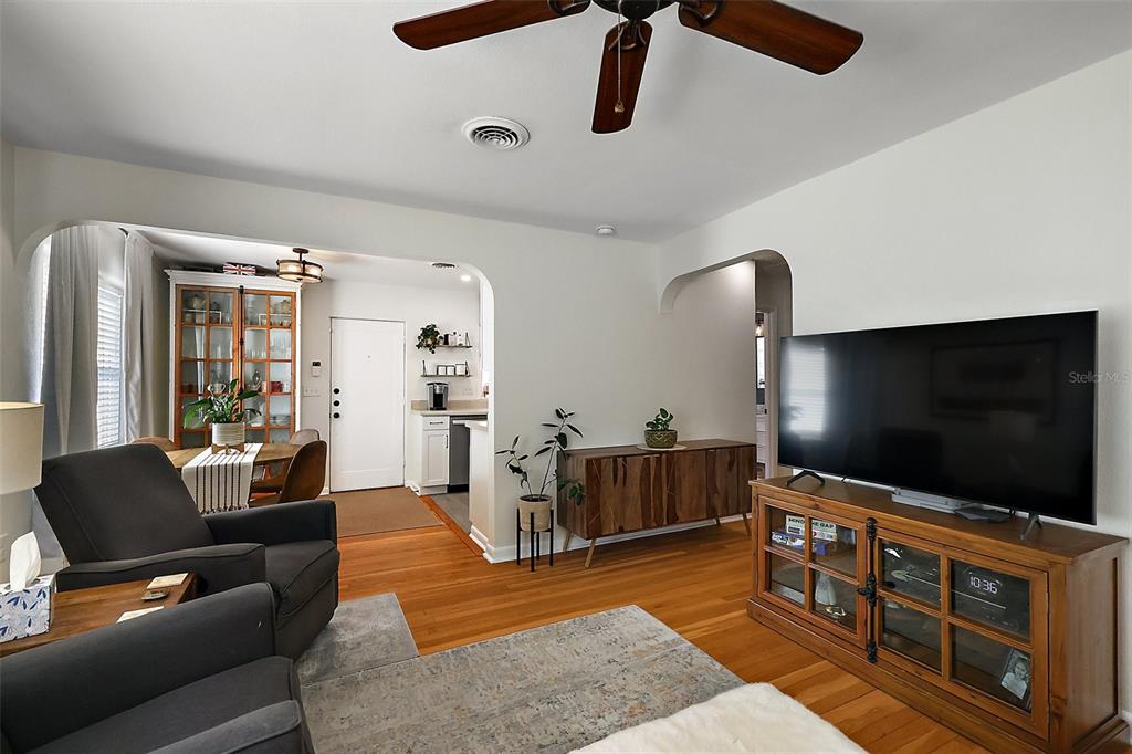 30 East Key Avenue Eustis, FL 32726 - Photo 8 of 32 a living room with furniture and a flat screen tv