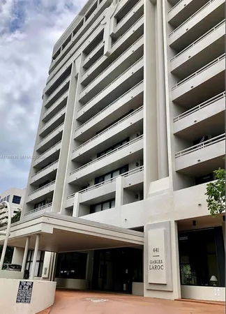 a view of building with view in front of it