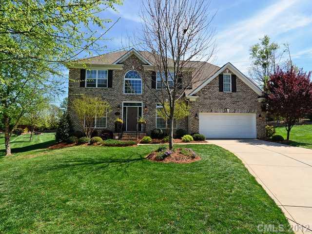 512 St Ives Court Fort Mill, SC 29708 - Photo 1 of 16 a front view of a house with sitting area and garden