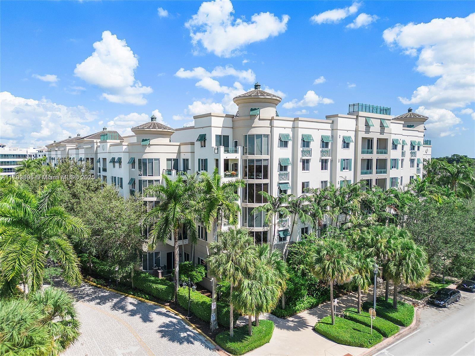 510 Northwest 84th Avenue, Unit 121 Plantation, FL 33324 - Photo 1 of 39 a view of a city with tall buildings and a yard