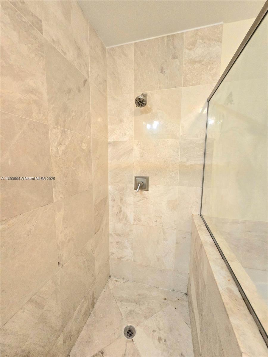 510 Northwest 84th Avenue, Unit 121 Plantation, FL 33324 - Photo 21 of 39 a bathroom with a shower