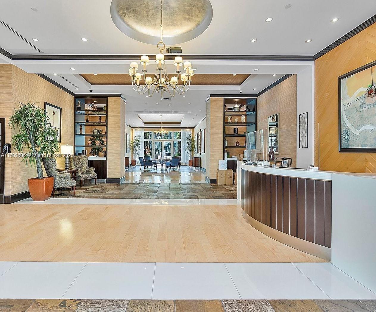 510 Northwest 84th Avenue, Unit 121 Plantation, FL 33324 - Photo 3 of 39 a view of a room with a chandelier