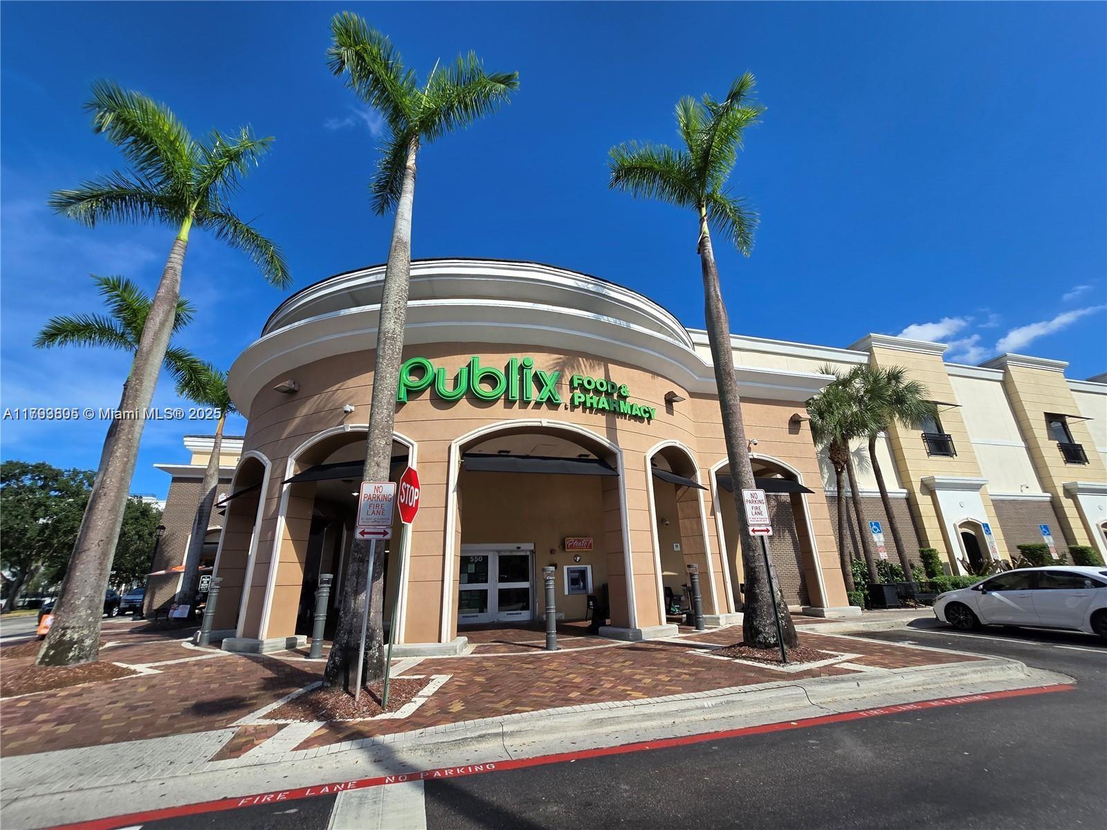 510 Northwest 84th Avenue, Unit 121 Plantation, FL 33324 - Photo 33 of 39 a vase of flowers sitting on a floor in front of a house