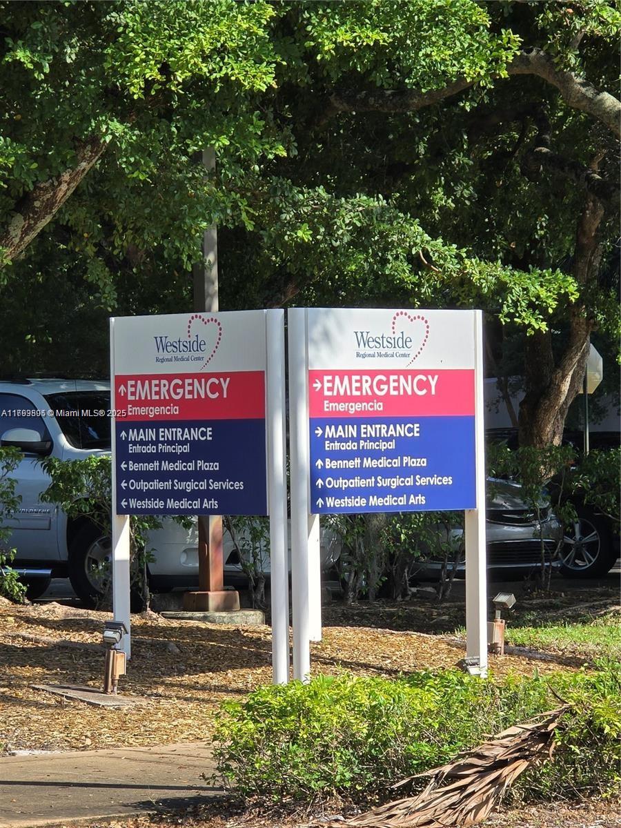 510 Northwest 84th Avenue, Unit 121 Plantation, FL 33324 - Photo 34 of 39 a sign that is on the side of a building