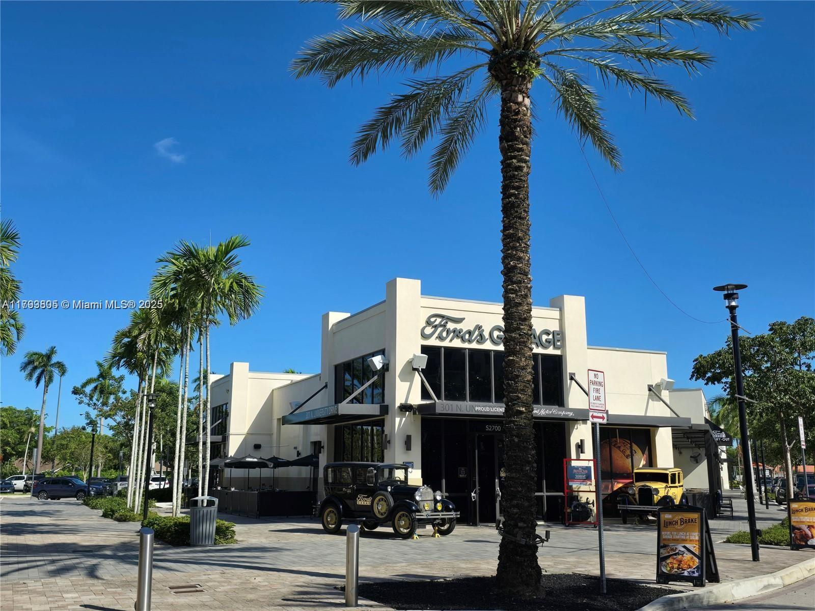 510 Northwest 84th Avenue, Unit 121 Plantation, FL 33324 - Photo 35 of 39 a front view of a building with street view