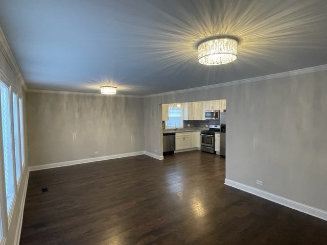 2814 Lexington Drive Hazel Crest, IL 60429 - Photo 2 of 10 a view of empty room with wooden floor and window
