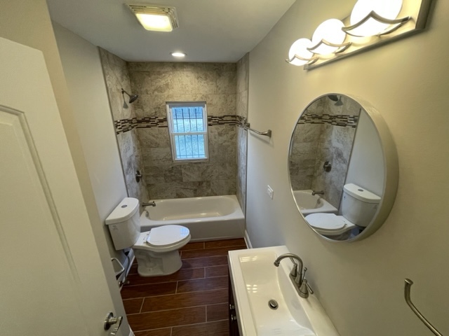 2814 Lexington Drive Hazel Crest, IL 60429 - Photo 6 of 10 a bathroom with a sink a toilet and a mirror