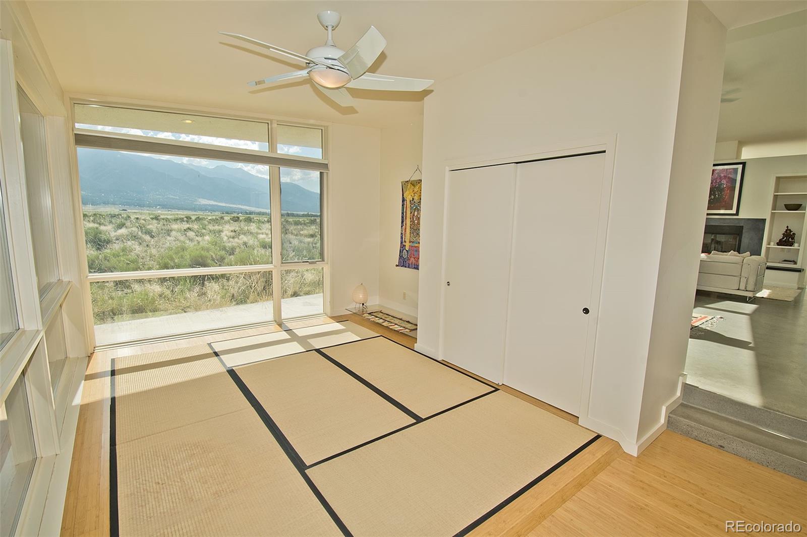 790 Birch Road Crestone, CO 81131 - Photo 29 of 45 a view of a room with a ceiling fan