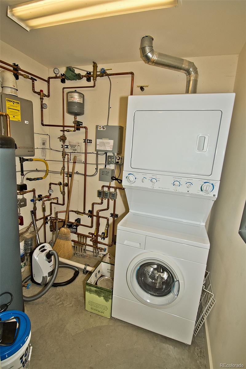 790 Birch Road Crestone, CO 81131 - Photo 34 of 45 a utility room with multiple dryer