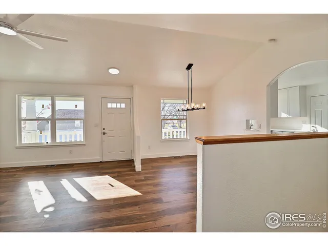 a view of an empty room and window