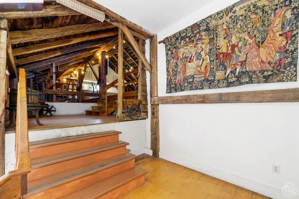 a view of a swimming pool with a outdoor seating