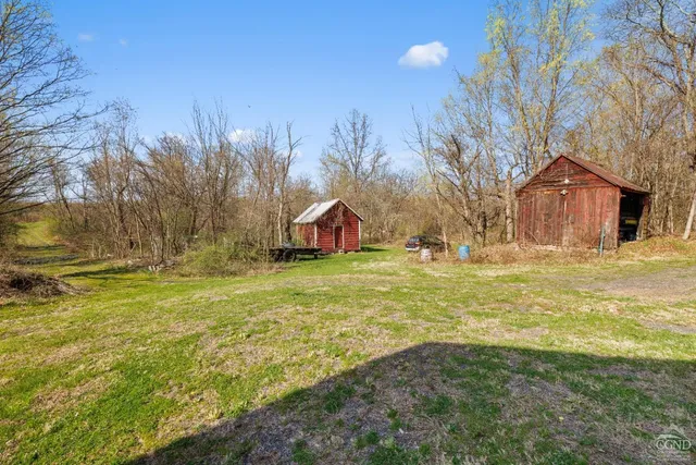a view of yard covered with snow