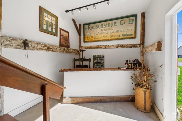 a view of a living room and floor to ceiling window