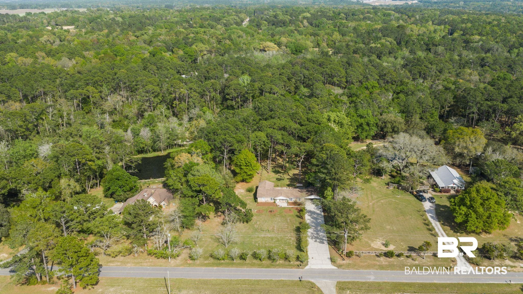 22800 River Road South Daphne, AL 36526 - Photo 51 of 52 Drone / aerial view of a heavily wooded area