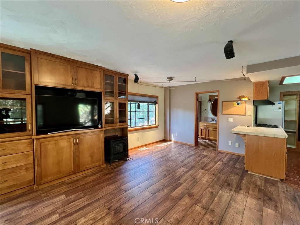 3151 Ramsey Road Cambria, CA 93428 - Photo 14 of 46 Built in cabinetry, sound system and TV already installed for your streaming subscriptions.