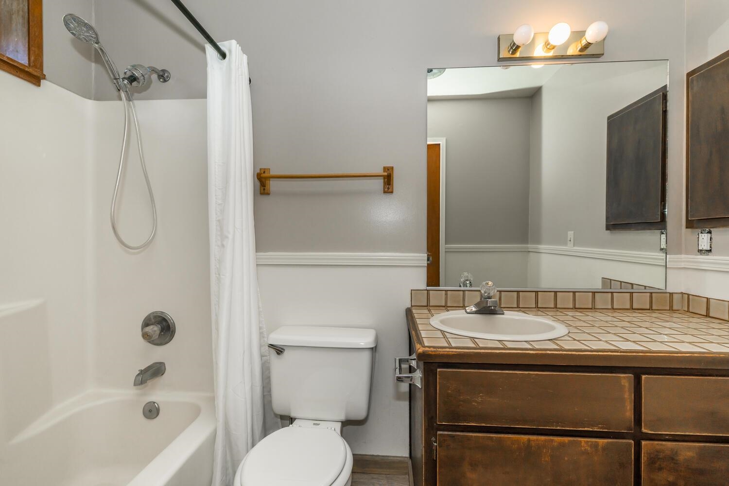 10332 Sugar Pine Road Truckee, CA 96161 - Photo 18 of 25 a bathroom with a sink toilet and shower