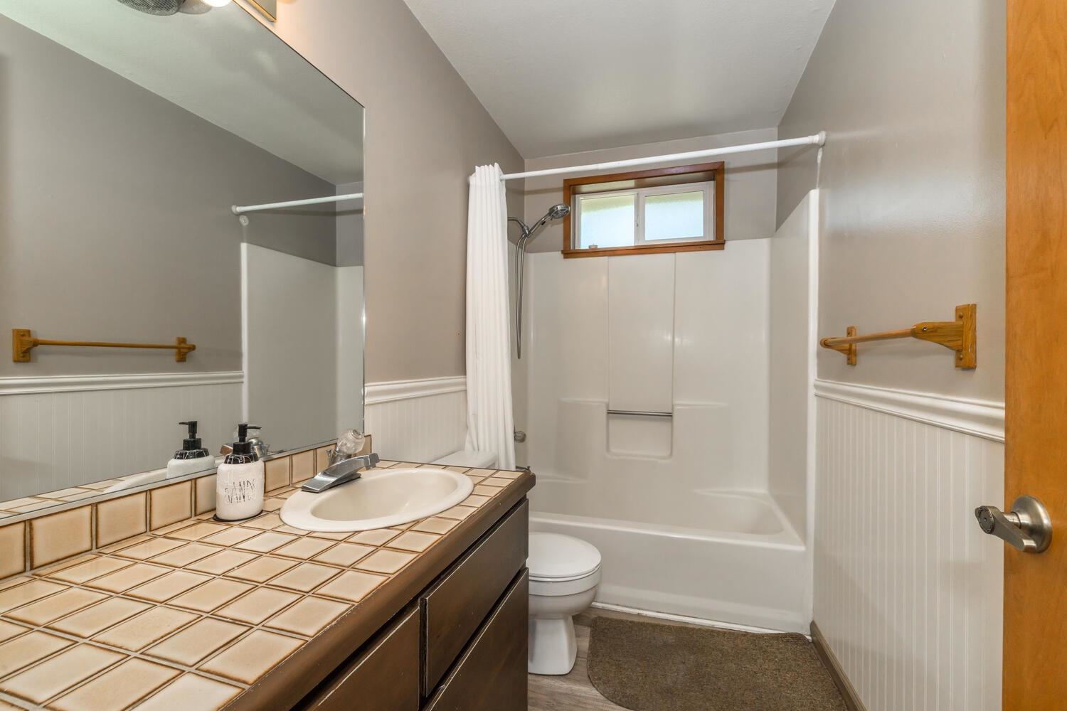 10332 Sugar Pine Road Truckee, CA 96161 - Photo 23 of 25 a bathroom with a granite countertop sink toilet and shower