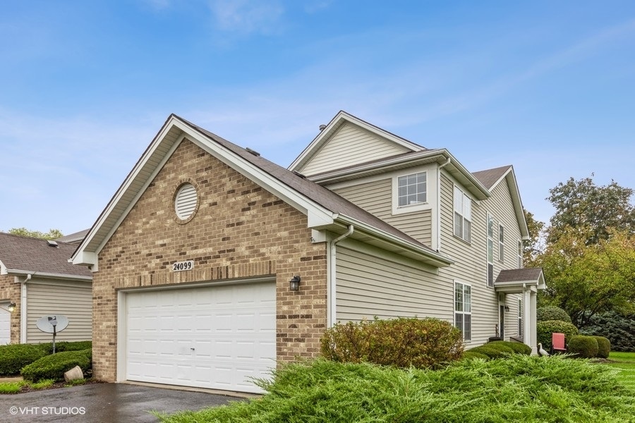 a view of outdoor space yard and garage