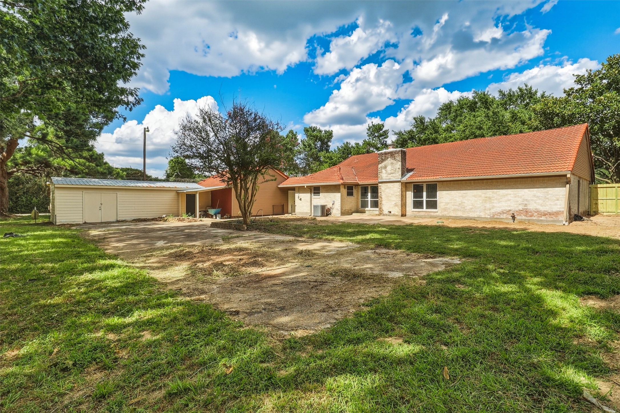 22923 Tomball Cemetery Road Tomball, TX 77377 - Photo 38 of 50 Love this backyard space! So many options to entertain in this spacious patio area.