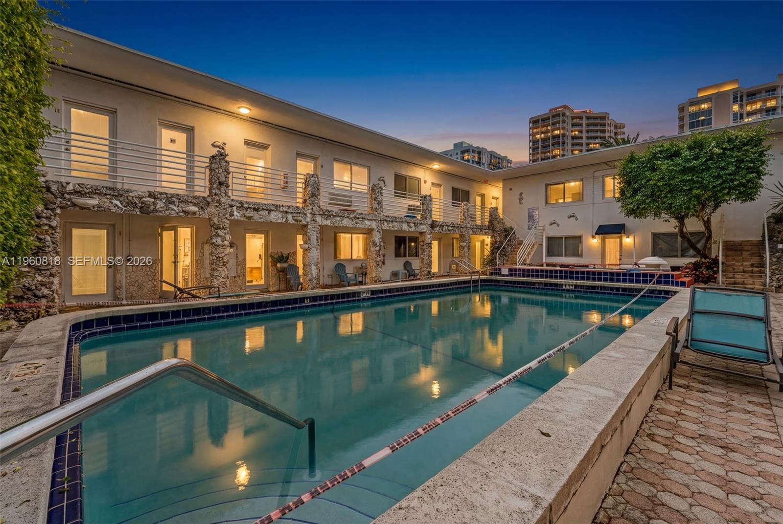 a view of a house with swimming pool