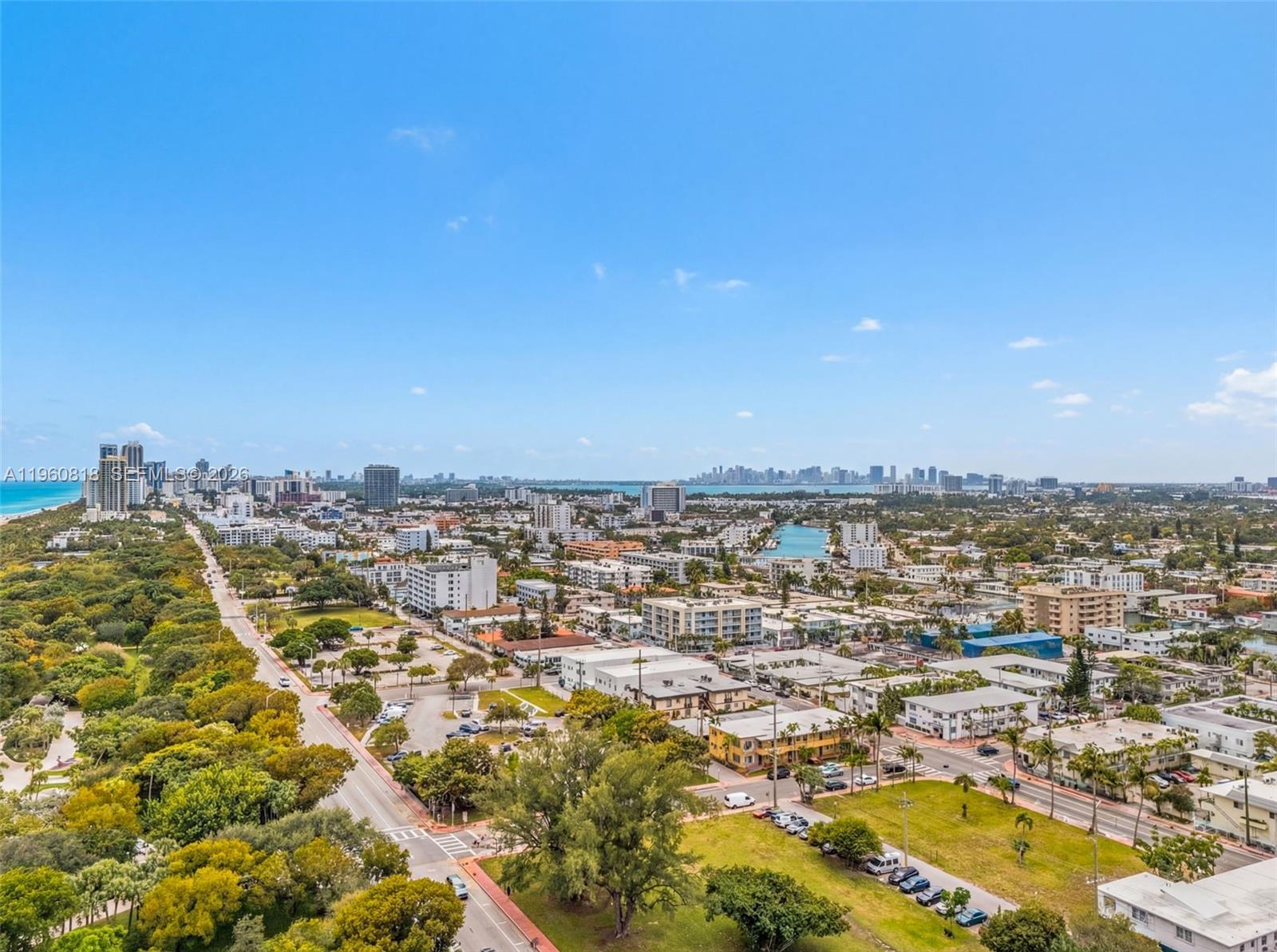 320 85th Street, Unit 15 Miami Beach, FL 33141 - Photo 13 of 13 an aerial view of residential houses with outdoor space
