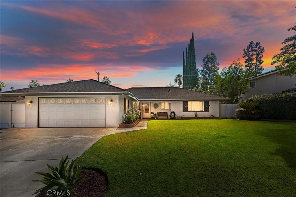 2831 Gertrude Street Riverside, CA 92506 - Photo 1 of 1 a front view of a house with yard