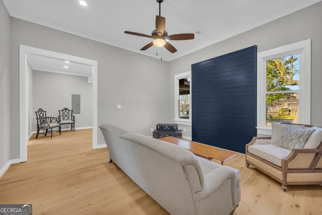 a bathroom with a toilet a sink and a mirror