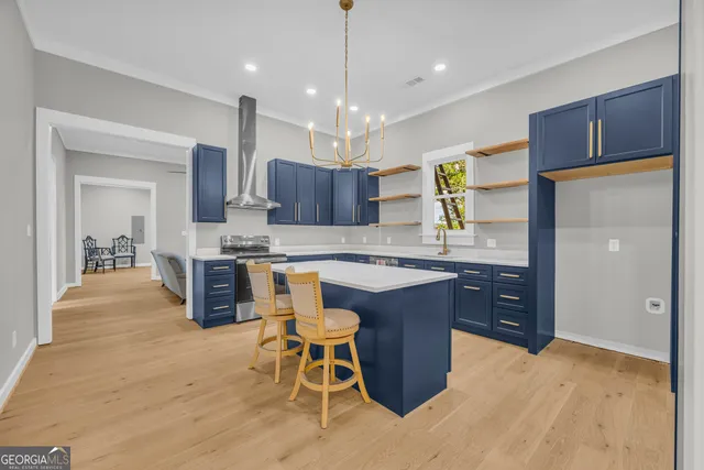 a view of a livingroom with a fireplace and workspace
