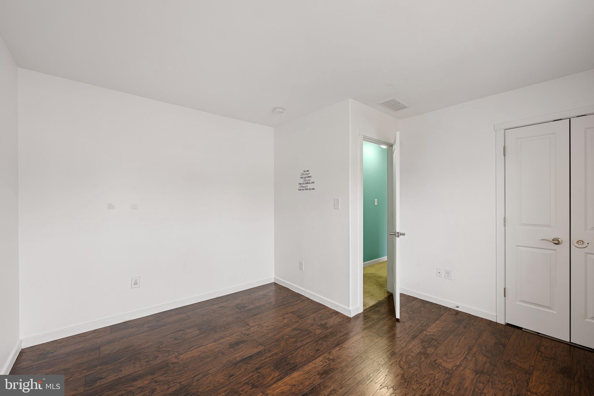 42 Mer Way Dover, DE 19901 - Photo 12 of 36 a view of an empty room with wooden floor