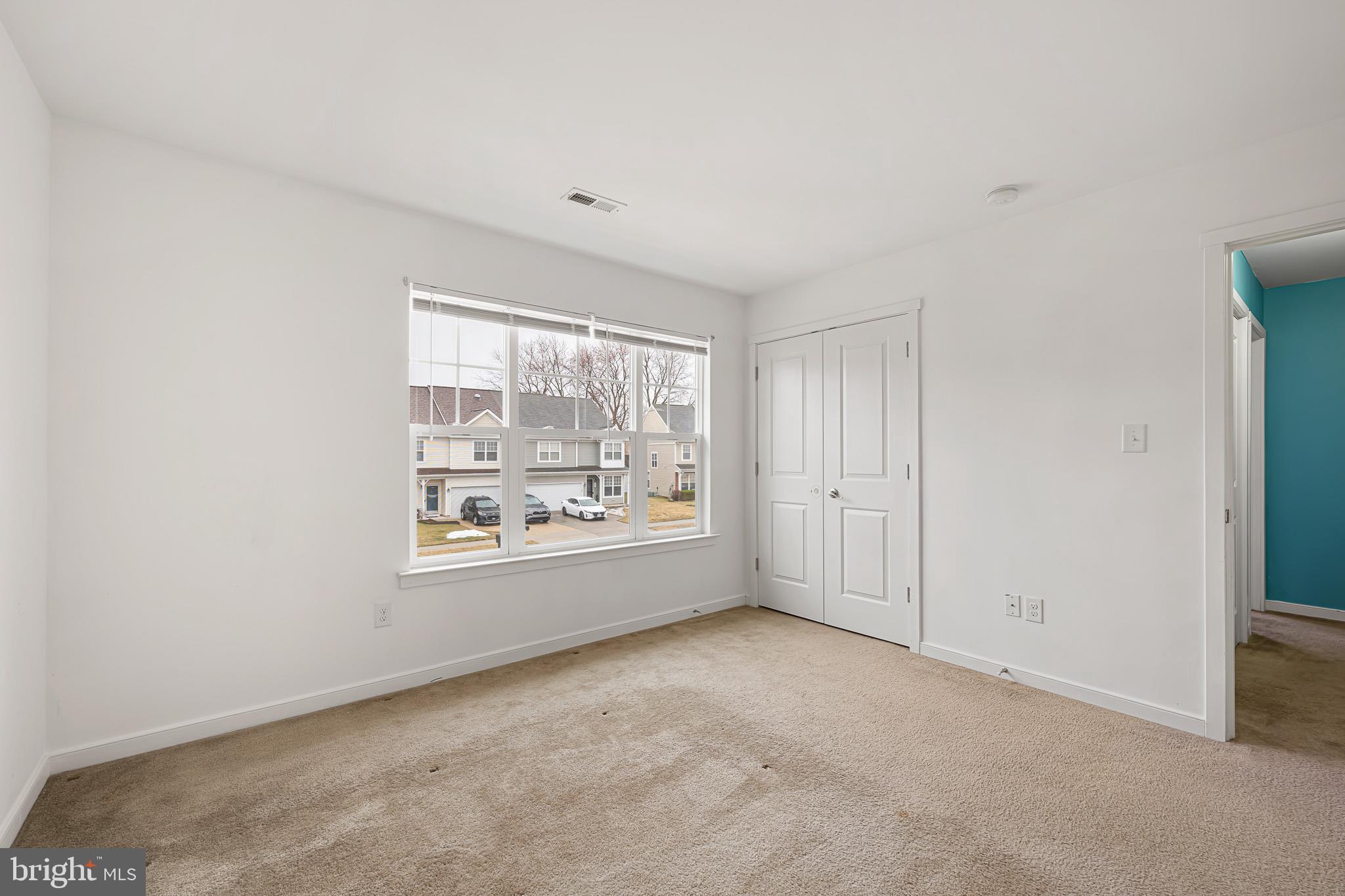 42 Mer Way Dover, DE 19901 - Photo 14 of 36 an empty room with large windows