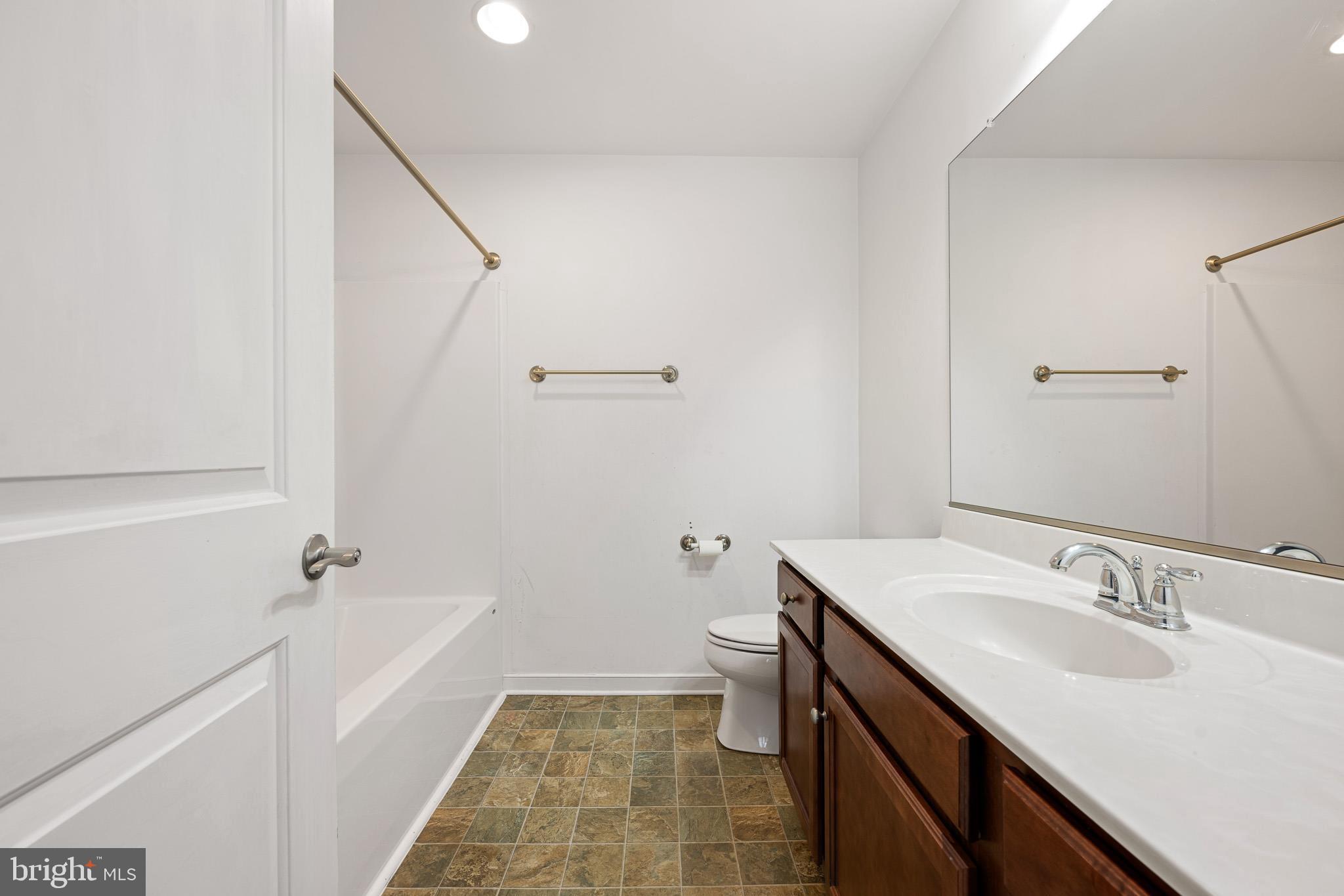 42 Mer Way Dover, DE 19901 - Photo 18 of 36 a bathroom with a sink toilet and shower