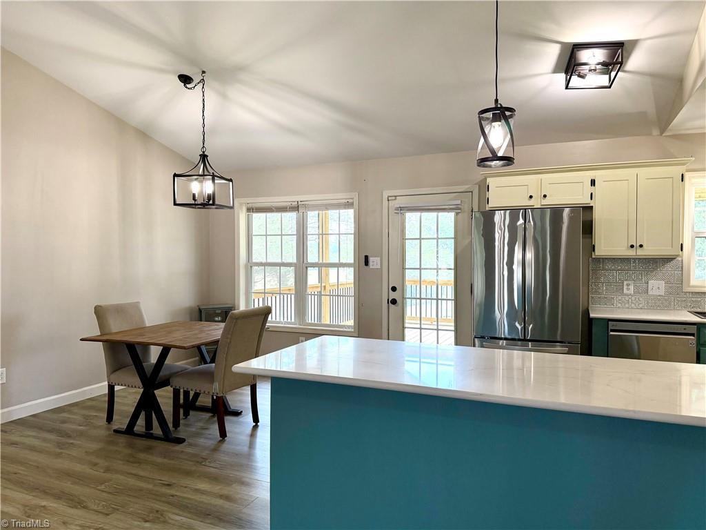 1027 Tabor Road Olin, NC 28660 - Photo 31 of 43 kitchen bar & dining area