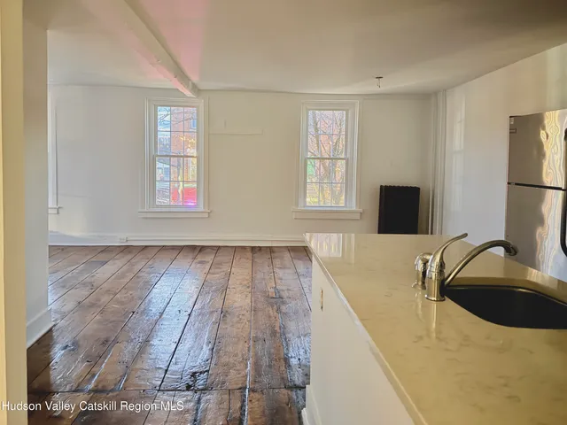 a bathroom with a sink and a bathtub