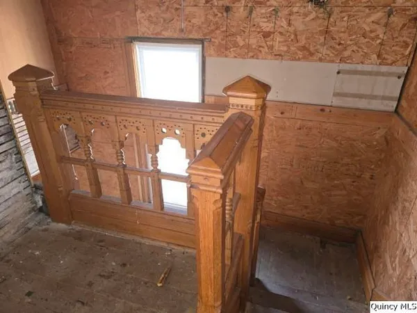 a view of entry way with wooden door