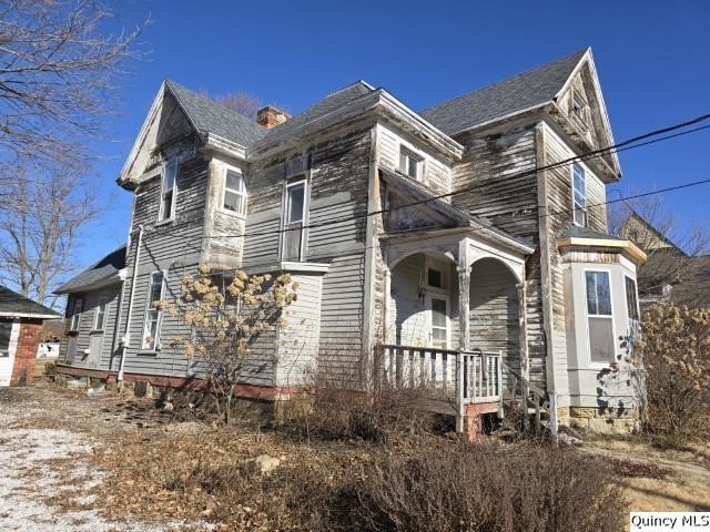 243 Main Street Carthage, IL 62321 - Photo 24 of 26 front view of a house with a yard