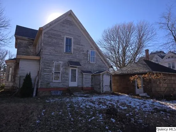 a view of a house with a garage