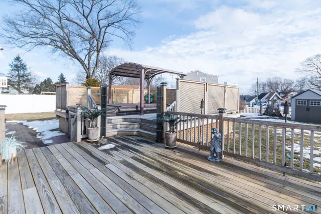 a balcony with next to a yard