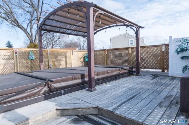 a kitchen with stainless steel appliances kitchen island granite countertop a sink and cabinets