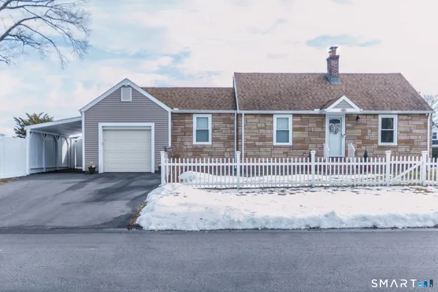 a front view of a house with a garage
