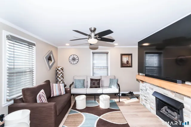 a living room with furniture and a window