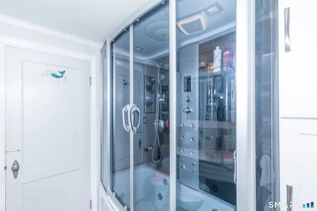 a room with a rug and a couch