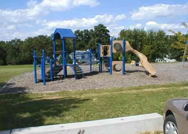 a view of a park with slide