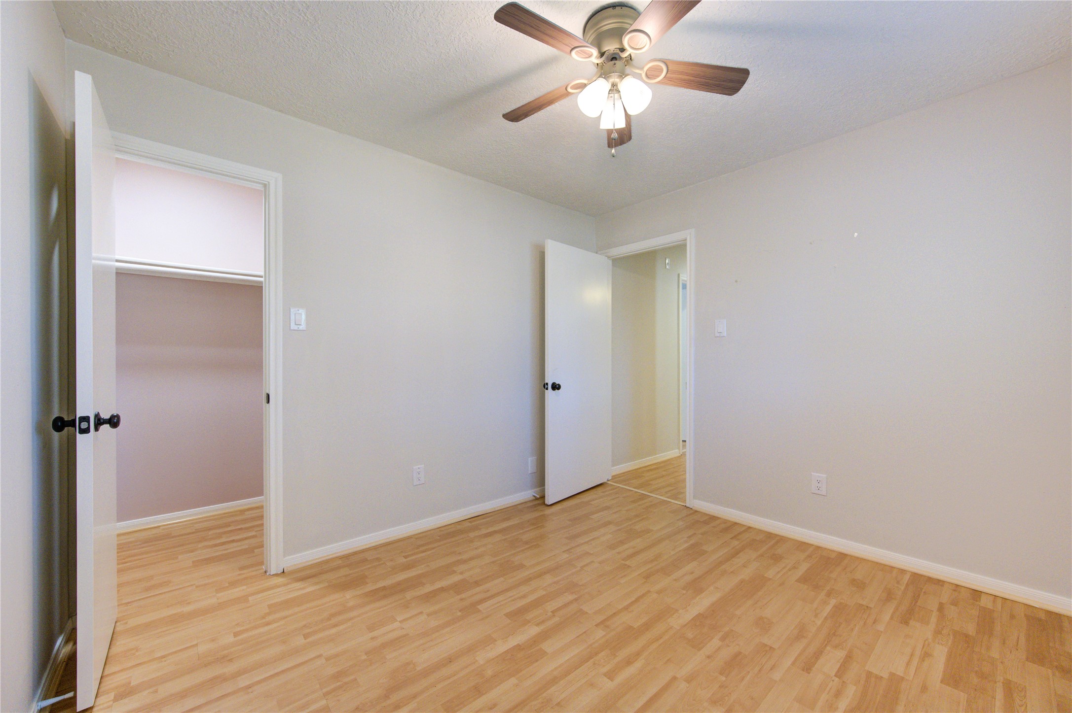 2518 Calvary Lane Katy, TX 77449 - Photo 14 of 26 a view of an empty room with a chandelier fan