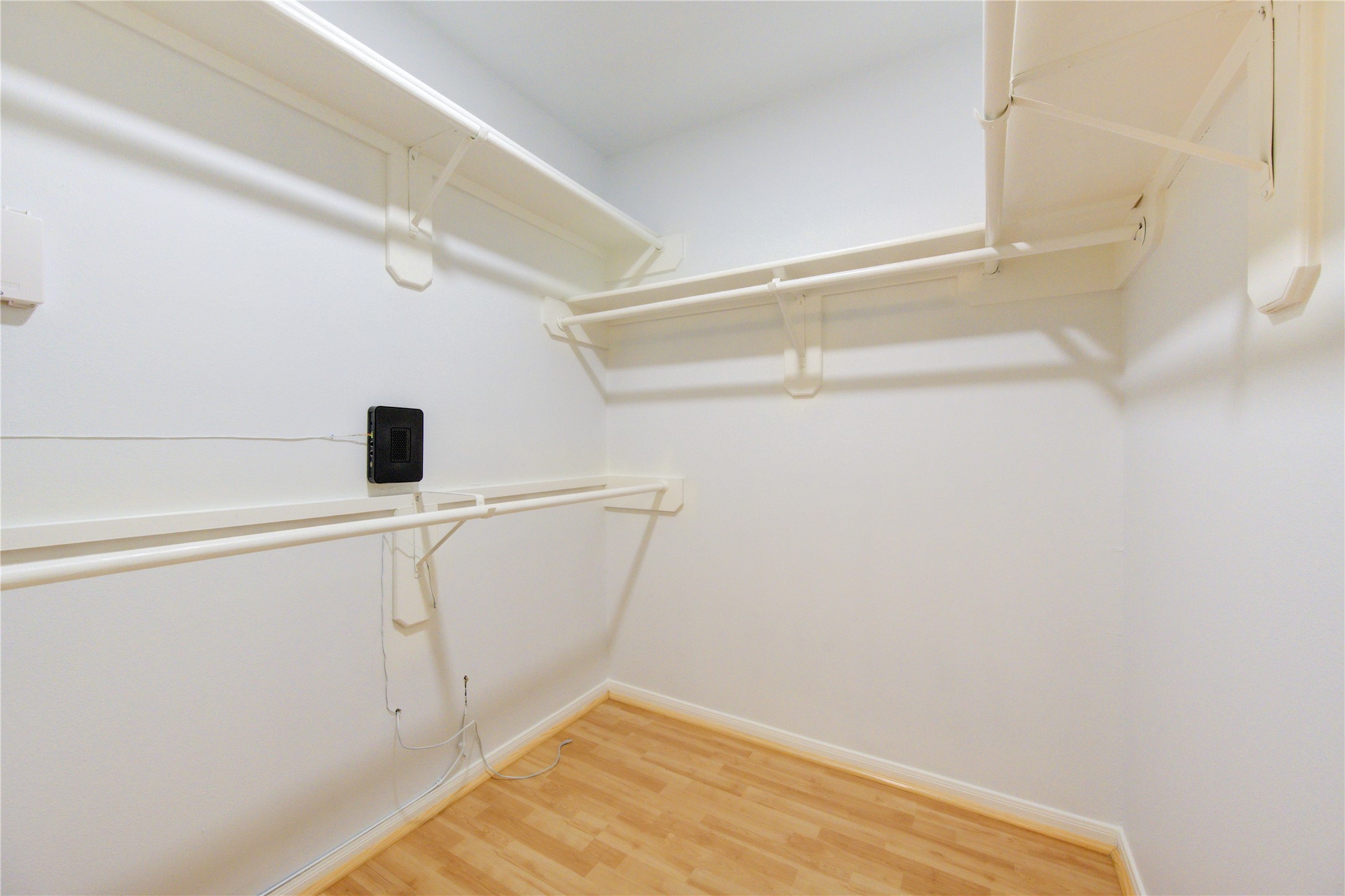 2518 Calvary Lane Katy, TX 77449 - Photo 23 of 26 a view of a room with racks on the wall