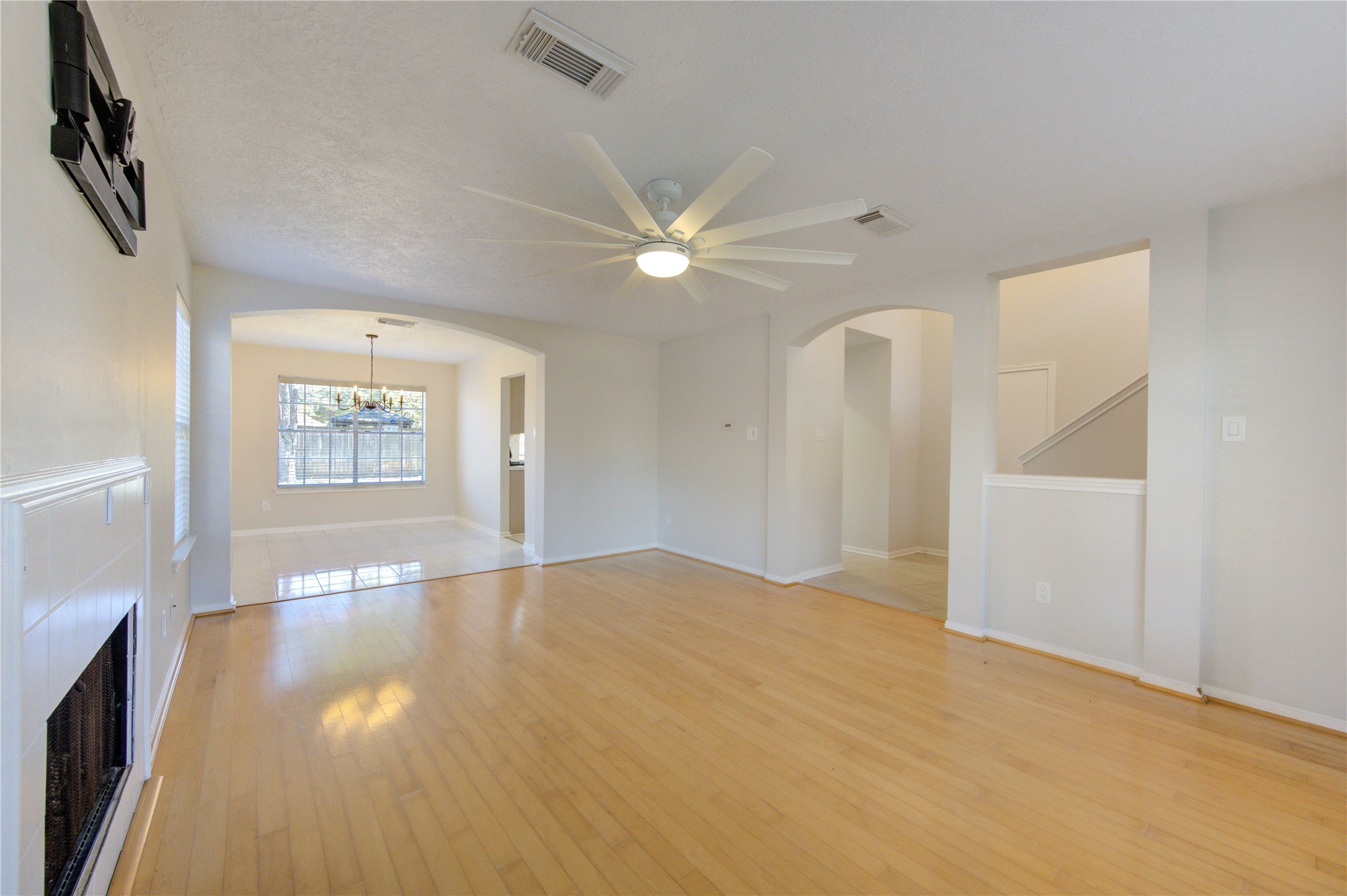2518 Calvary Lane Katy, TX 77449 - Photo 6 of 26 wooden floor in an empty room with a window