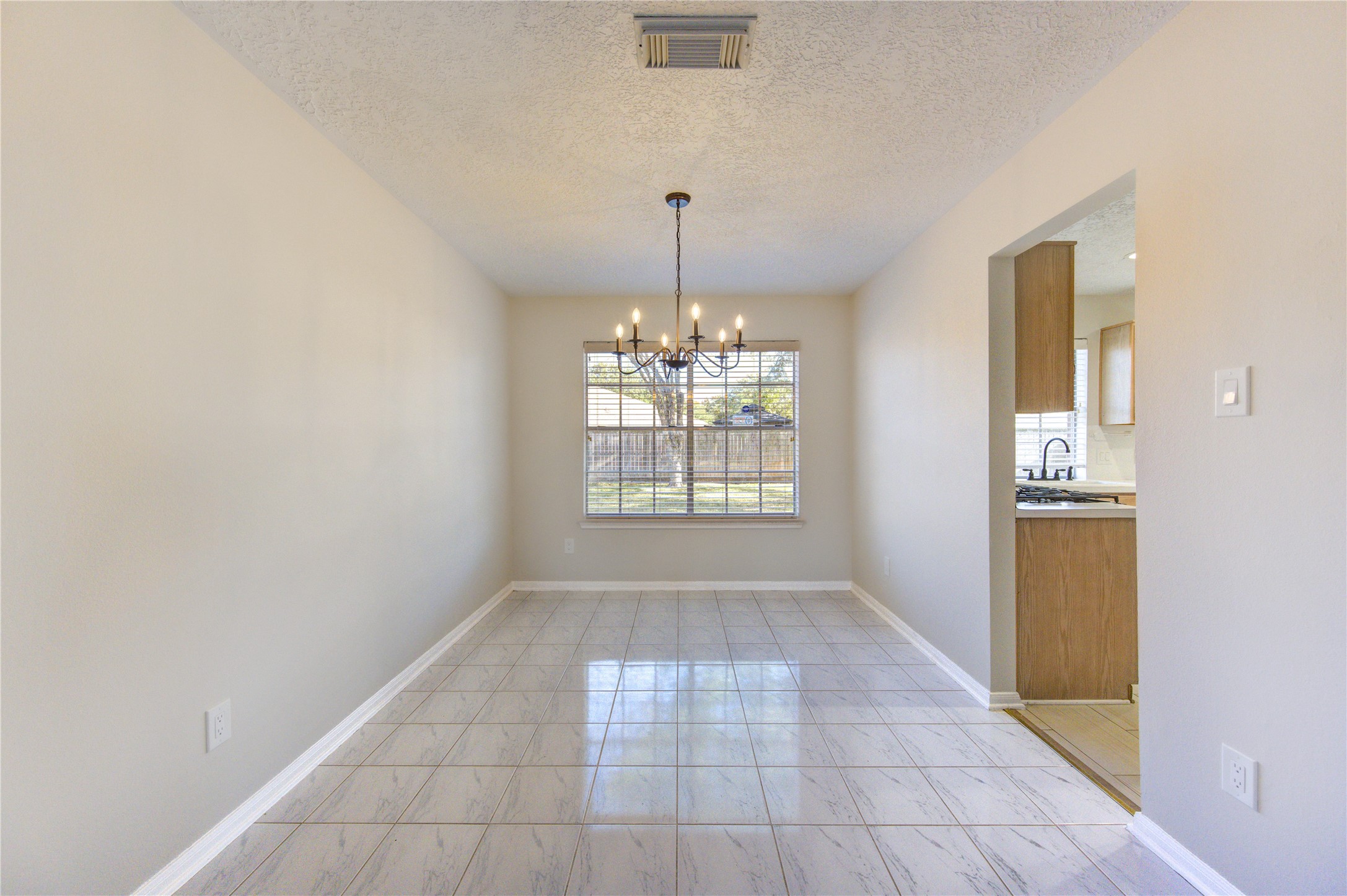 2518 Calvary Lane Katy, TX 77449 - Photo 7 of 26 a view of an empty room with a window