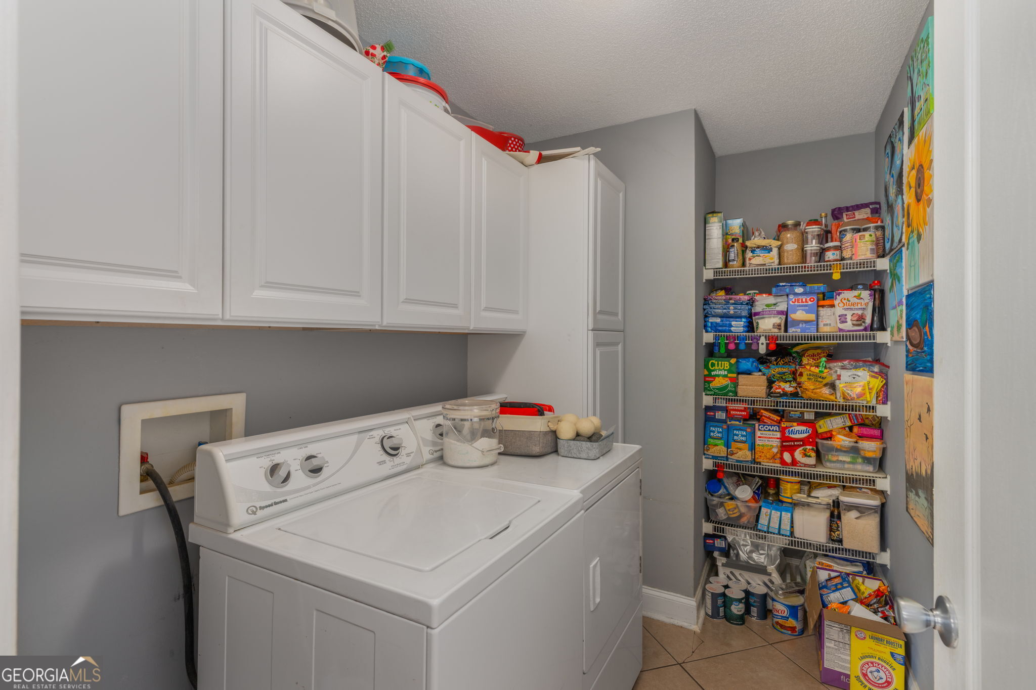 105 Galloway Street Kathleen, GA 31047 - Photo 12 of 35 a utility room with dryer and washer