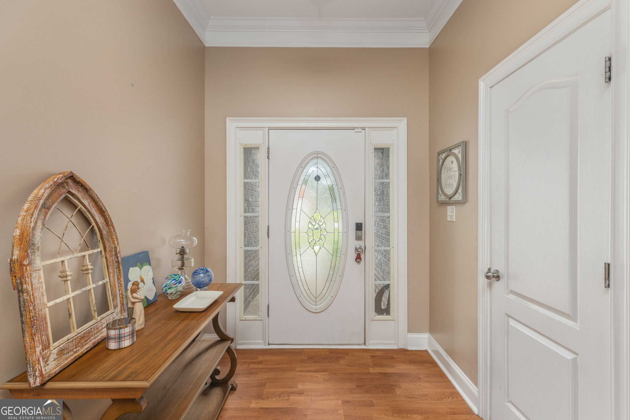 105 Galloway Street Kathleen, GA 31047 - Photo 20 of 35 a view of a livingroom with wooden floor and a swimming pool