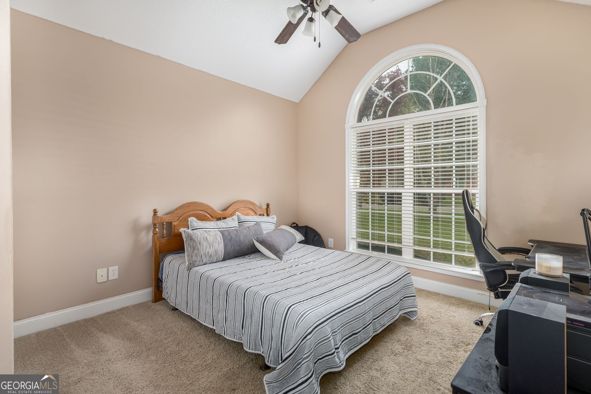 105 Galloway Street Kathleen, GA 31047 - Photo 25 of 35 a bedroom with a bed and a window