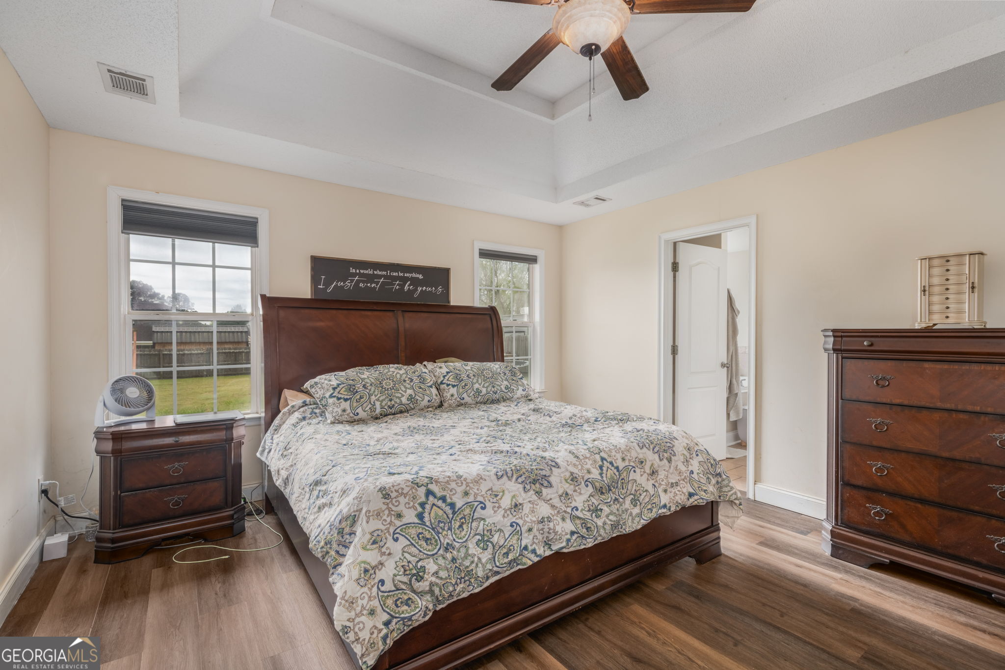 105 Galloway Street Kathleen, GA 31047 - Photo 30 of 35 a bedroom with a bed and wooden floor